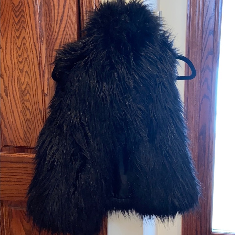 Gently worn INC black fur Vest size Small
